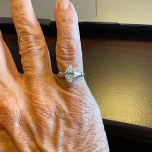 Platnum Diamond Marquise Brilliant 1.21 CT with 2 tapered baguettes .14 CT